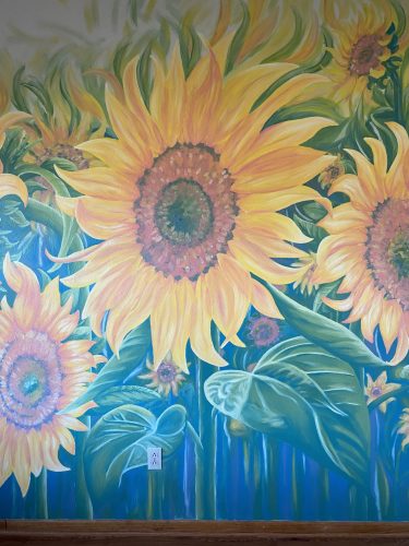 An energetic field of sunflowers for your living room